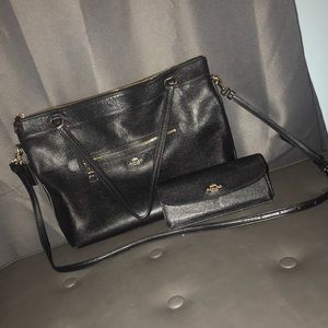 Large black coach bag with matching wallet.
